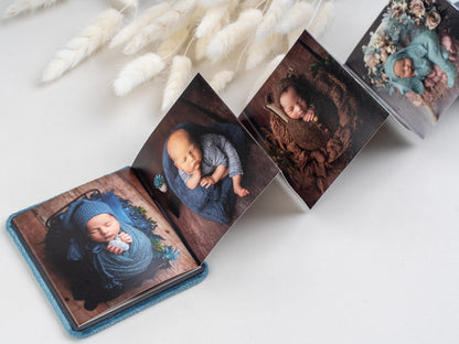 otroška foto knjiga odprta fotografije dojenčka